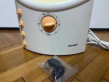Ostali aparati za negu lica: Solarijum lampa za lice (kućni mini-facial tanner) Opis: - Kompaktna — 9