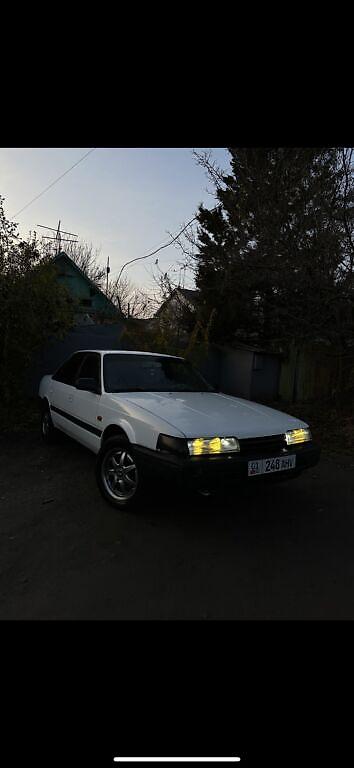 вампер 124: Mazda 626: 1994 г., 2 л, Механика, Бензин, Седан — 7