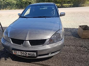 митсубиси спейс стар: Mitsubishi Lancer: 2005 г., 1.6 л, Механика, Бензин, Седан — 4
