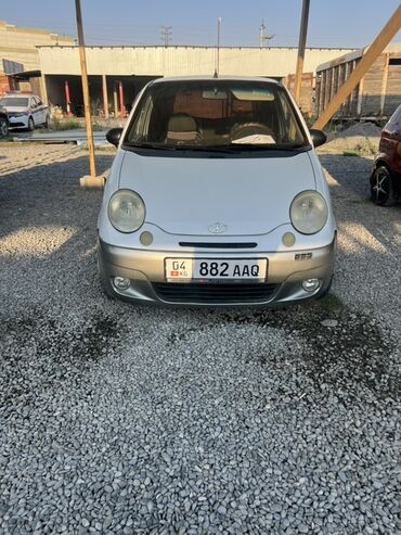 запчасти опель омега б: Белый городской автомобиль Daewoo Matiz с компактным кузовом, идеально
