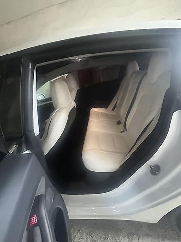 топаз авто: Tesla Model 3, ağ mirvari rəng, elektrik sedan. Amerikadan yüngül — 10