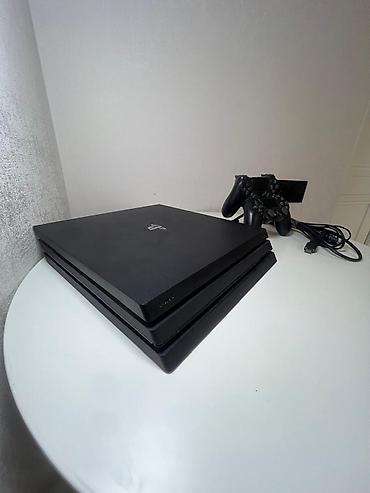 PS4 (Sony PlayStation 4): PlayStation 4 Pro (черный) Комплектация: - игровая консоль PS4 Pro — 7