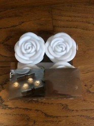 Sveće i svećnjaci: LED dekorativne svećice u obliku belih ruža – set 4 komada (Flower — 9