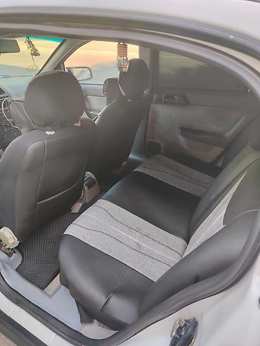 195 50 15: Opel Astra: 1.6 l | 2000 il 111222 km Sedan — 7