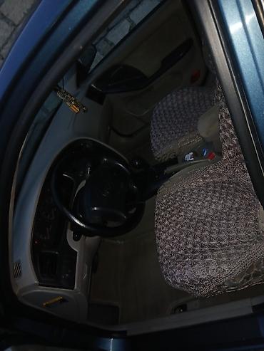 orta panel: Hyundai Elantra: 2 l | 2003 il Sedan — 6