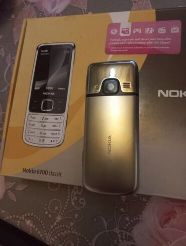 nokia e61: Nokia 6700 Slide, rəng - Gümüşü, Düyməli