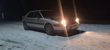 луаз авто: Mazda 323: 1993 г., 1.6 л, Механика, Бензин, Хэтчбэк