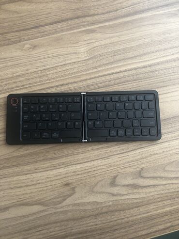 Klaviaturalar: Portativ qatlana bilən Bluetooth klaviatura məhsuldarlığı artırmaq