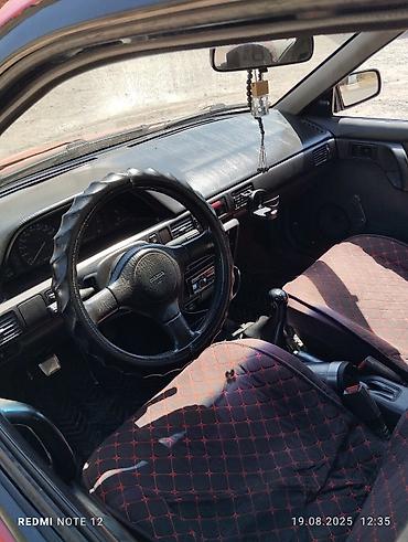mazda d: Mazda 323: 1991 г., 1.6 л, Механика, Бензин, Седан — 5