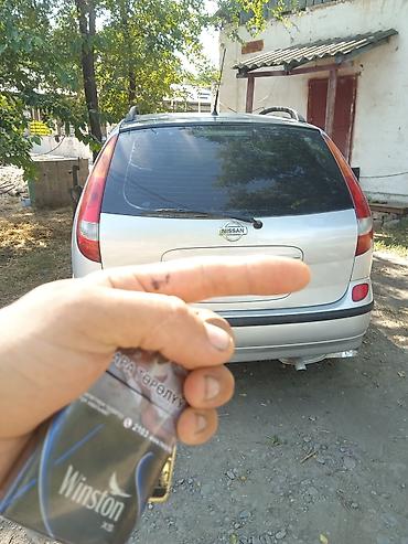 алмашаи: Nissan Almera Tino: 2001 г., 2 л, Механика, Бензин, Универсал — 5