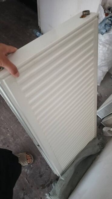 ev qizdiricilari: İdeal vəziyyətdə mənzilindən çıxartdığım kombi radiatorları satıram