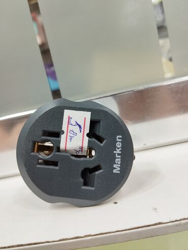 Digər: Marken universal səyahət adapteri. Bu adapter müxtəlif növ elektrik