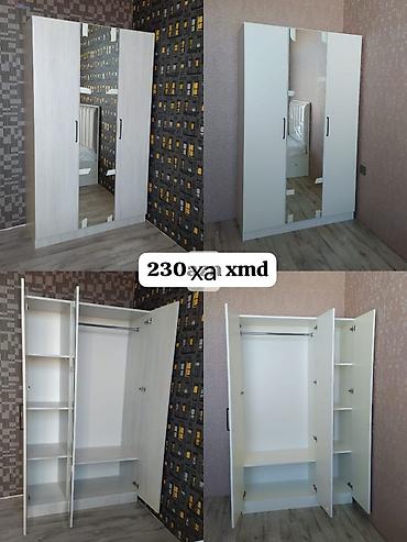 - Üç qapılı geyim dolabı - Ön hissədə mərkəzi tamhündür güzgü paneli -