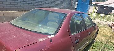 тунуке бу: Nissan Primera: 1994 г. — 4