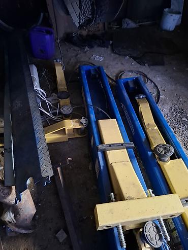 Автосервисное оборудование: Avtomobil üçün 4 sütunlu qaldırıcıya aid sürüşən domkrat platforması — 2