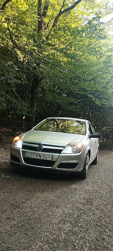 üstü açıq maşın: Opel Astra H, 5 qapılı hetçbek - Gümüşü rəng - Benzin mühərriki - Ön — 1
