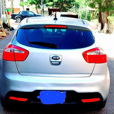 Kia Rio: 1.6 l | 2013 il Hetçbek