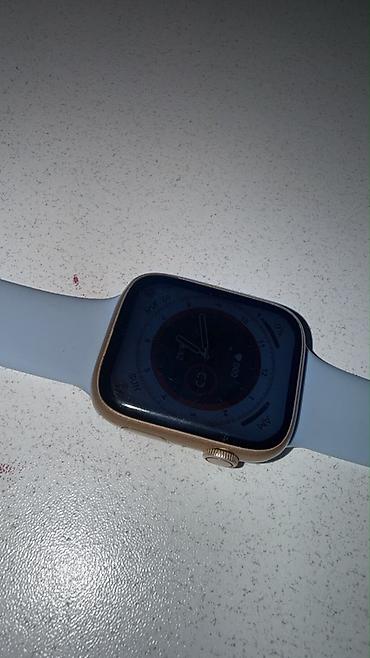 sato smart watch: Ağıllı Saat – kvadrat ekranlı, qızılı rəng korpus, açıq boz/səma-mavi — 1