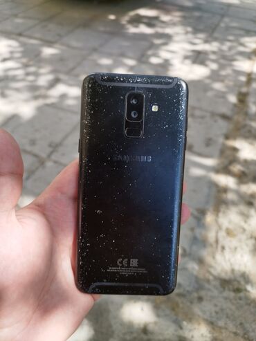oculus plus qiyməti bakida: Samsung Galaxy A6 Plus, 32 GB, rəng - Qara, Barmaq izi, İki sim kartlı, Face ID
