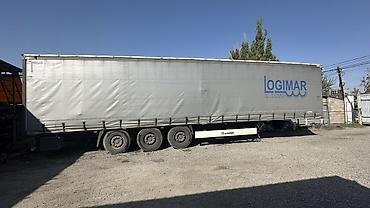 Унаа: Тентованный полуприцеп KRONE (шторный) - Тип: полуприцеп-тент — 1