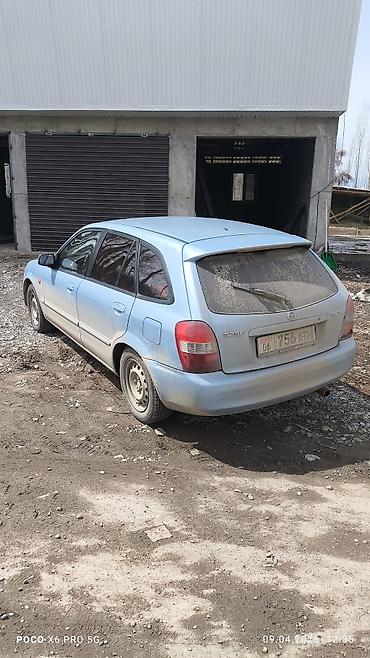 Унаа: Mazda 323: 2002 г., 1.6 л, Кол менен иштөөчү, Бензин, Универсал — 3