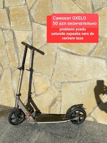 купить трюковой самокат в бишкеке: Oxelo firmasının skuteridir. Tənzimlənən hündürlüyə malikdir. Şəhər