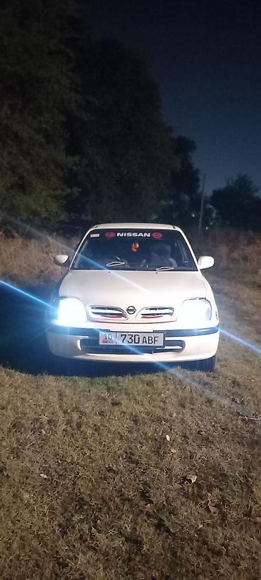несс: Nissan March: 1999 г., 0.1 л, Автомат, Бензин, Хэтчбэк — 5