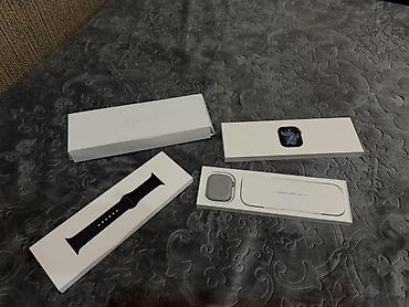 smart saaat: Apple Watch Series 11,46 mm – boz/alüminium korpus, qara silikon idman — 2