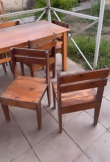 mebel stol stul: Tecili satilir. Taxta lakli. Uzun 10 neferlik masa. 10 oturacaq. Bu — 4