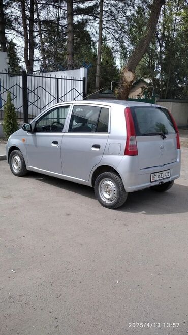 авто чихол: Daihatsu Cuore: 2003 г., 1 л, Механика, Бензин, Хэтчбэк