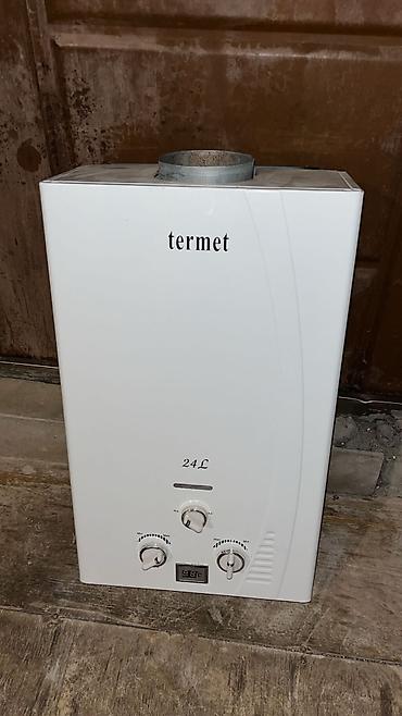 termet pitminutka: Termet qazla işləyən axın tipli su qızdırıcısı - Tutum: 24 L - Ön — 1