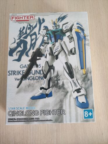 детские игрушки новые: Продаю Gundam model Qinglong Fighter 1/144 Хорошего качества новая в