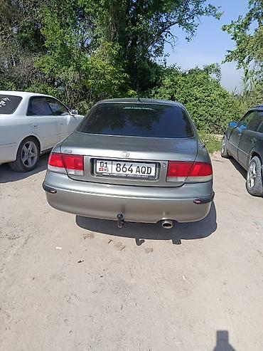 бу чехол: Mazda 626: 1996 г., 2 л, Механика, Бензин, Седан — 5
