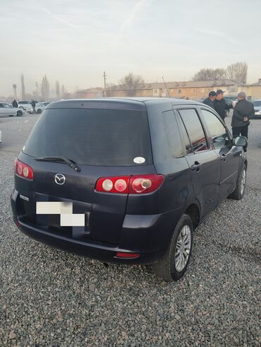 авто освежитель: Mazda Demio: 2004 г., 1.3 л, Автомат, Бензин