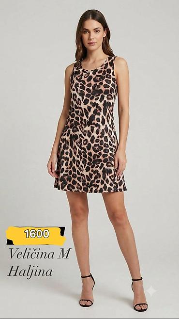 ugg 40: Haljina sa leopard printom bez rukava, okrugli izrez. - Kroj: blago — 1