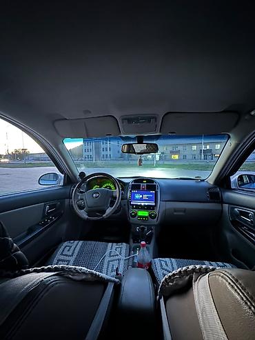 385 55: Продаётся седан Kia Cerato серебристого цвета. Автомобиль 4-дверный — 6
