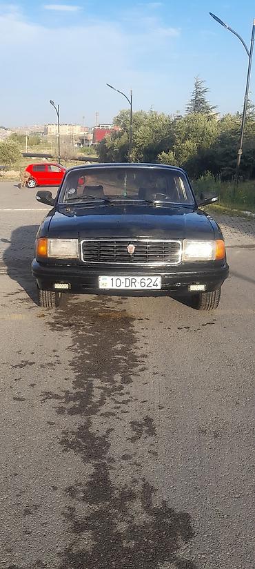 QAZ Volga 3129, qara rəng. Klassik sedan kuzov, xrom ön barmaqlıq