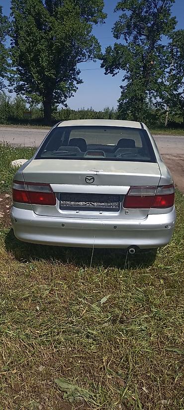 кочкор авто: Mazda Capella: 1998 г., 1.8 л, Автомат, Бензин, Седан — 2