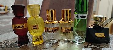 8 element parfüm: Müxtəlif ətir seçimi – 15 ml sprey şüşələr Qiy Tərkib: müxtəlif qadın — 3