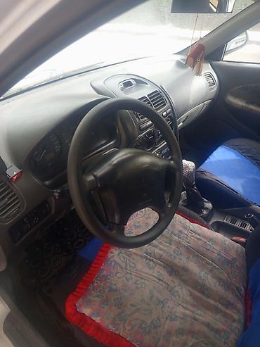 byd e2 2024: Mitsubishi Carisma: 2003 г., 1.8 л, Механика, Бензин, Седан — 4