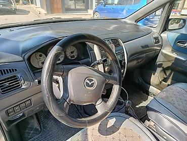 red cell: Mazda PREMACY: 2004 г., 1.8 л, Механика, Бензин, Универсал — 3