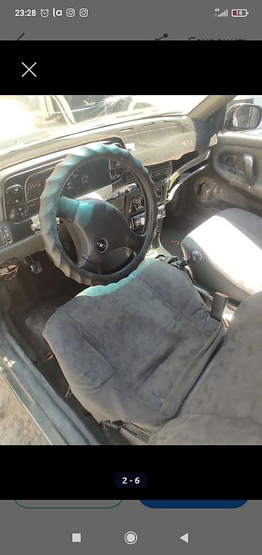 devo tiko: Daewoo Nexia: 2004 г., Механика, Бензин, Седан — 4