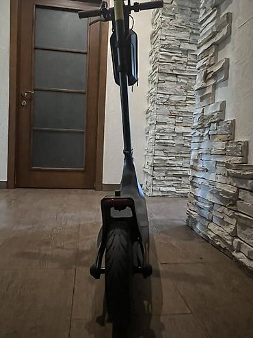 skuter xiaomi: Xiaomi elektrik skuter. Şəkillərdə qara rəngli, minimalist dizayna — 5