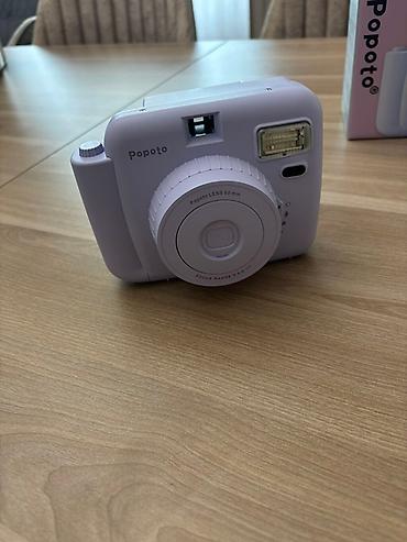 popo boyudən: Popoto ani çəkilən fotoaparat dəsti. Dəstə fotoaparatın özü, çexolu — 2