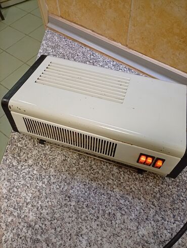 Kaloriferi: Električni grejač/ventilator (toplotni ventilator – “kalorifer”) za — 12