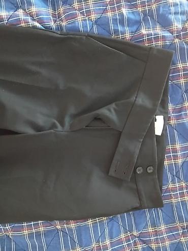 Pantalone: H&M Crne elegantne ženske pantalone sa širokom nogavicom. Model — 5