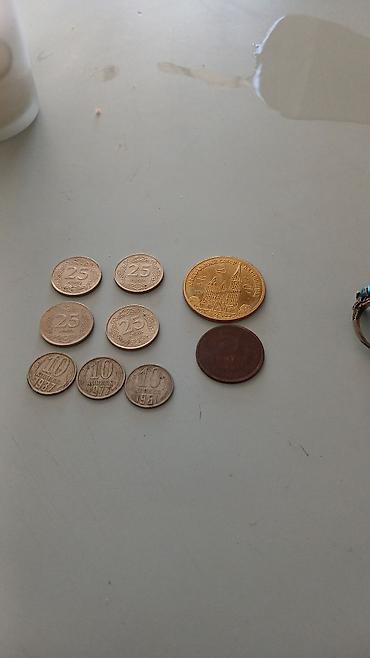 1 dollar 1988: Kolleksiya üçün sikkələr dəsti Tərkibi: - 4 ədəd 25 qəpik (SSRİ — 1