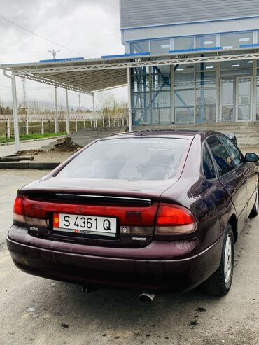 Mazda Cronos: 1991 г., 1.8 л, Механика, Бензин, Седан