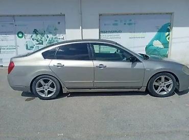 granta disk: Nissan Teana: 2.3 л | 2003 г. Седан — 2