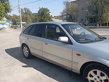 мазда демио шаравой: Mazda 323: 2003 г., 1.6 л, Механика, Бензин, Универсал — 3